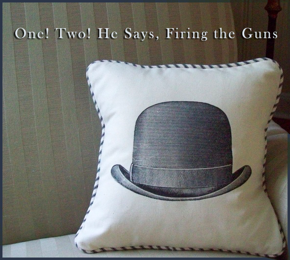photo of a pillow with story title One! Two! He Says, Firing the Guns